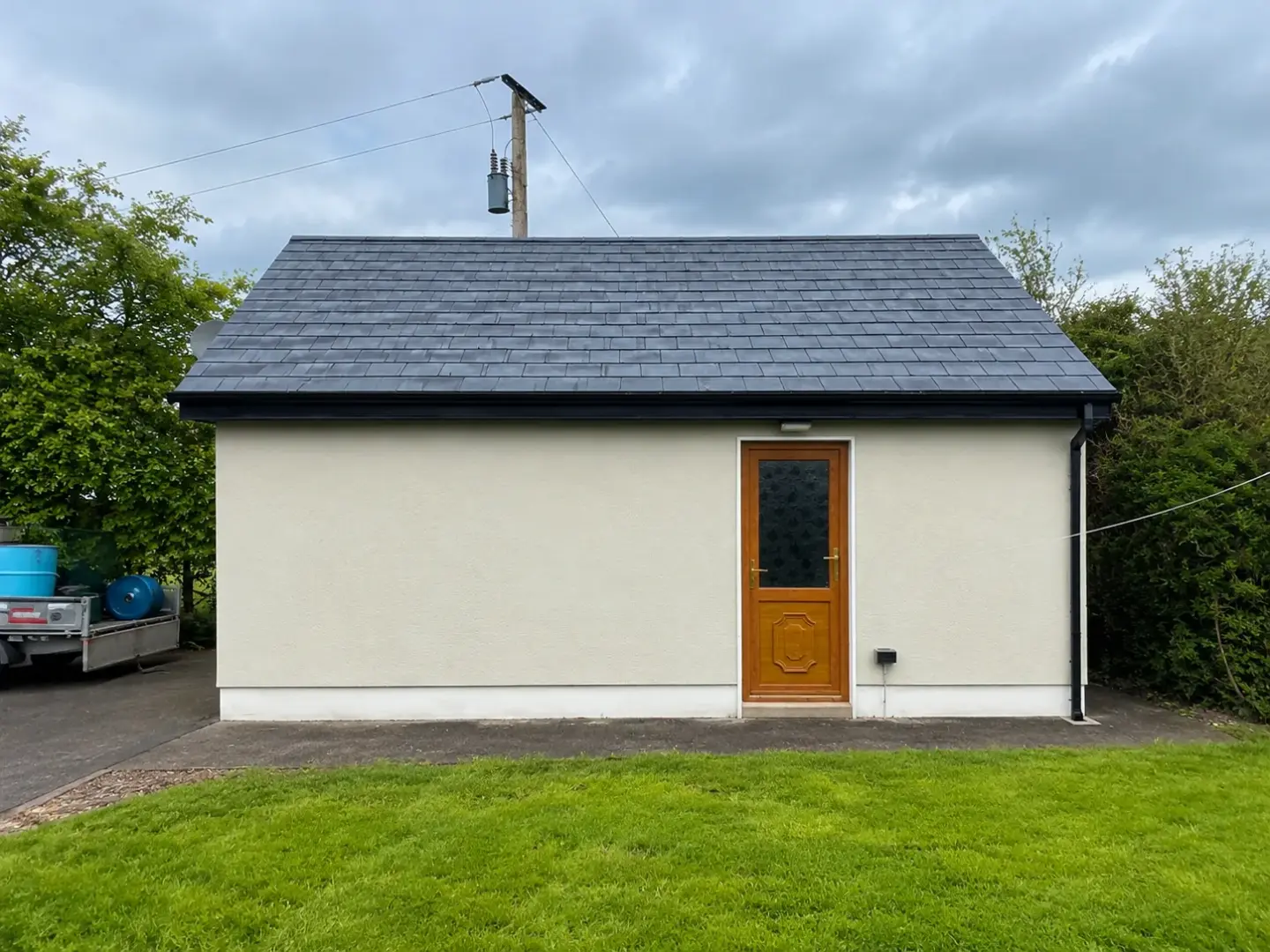Exterior wall after gutter cleaning, with the water staining removed